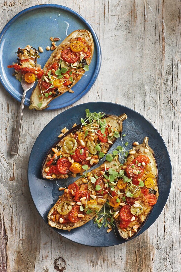 Stuffed aubergines with tomatoes and pine nuts
