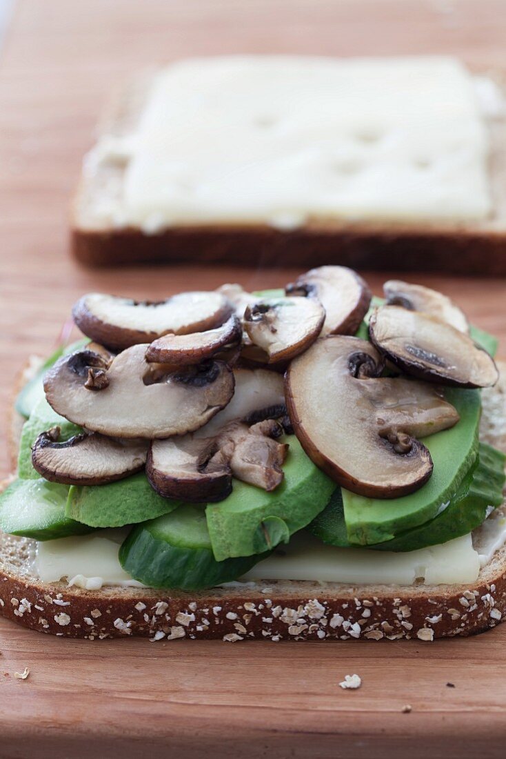 A summer sandwich with vegetables, mushrooms and cheese