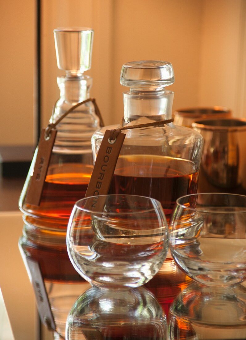 Bourbon and rye whiskey in crystal decanters