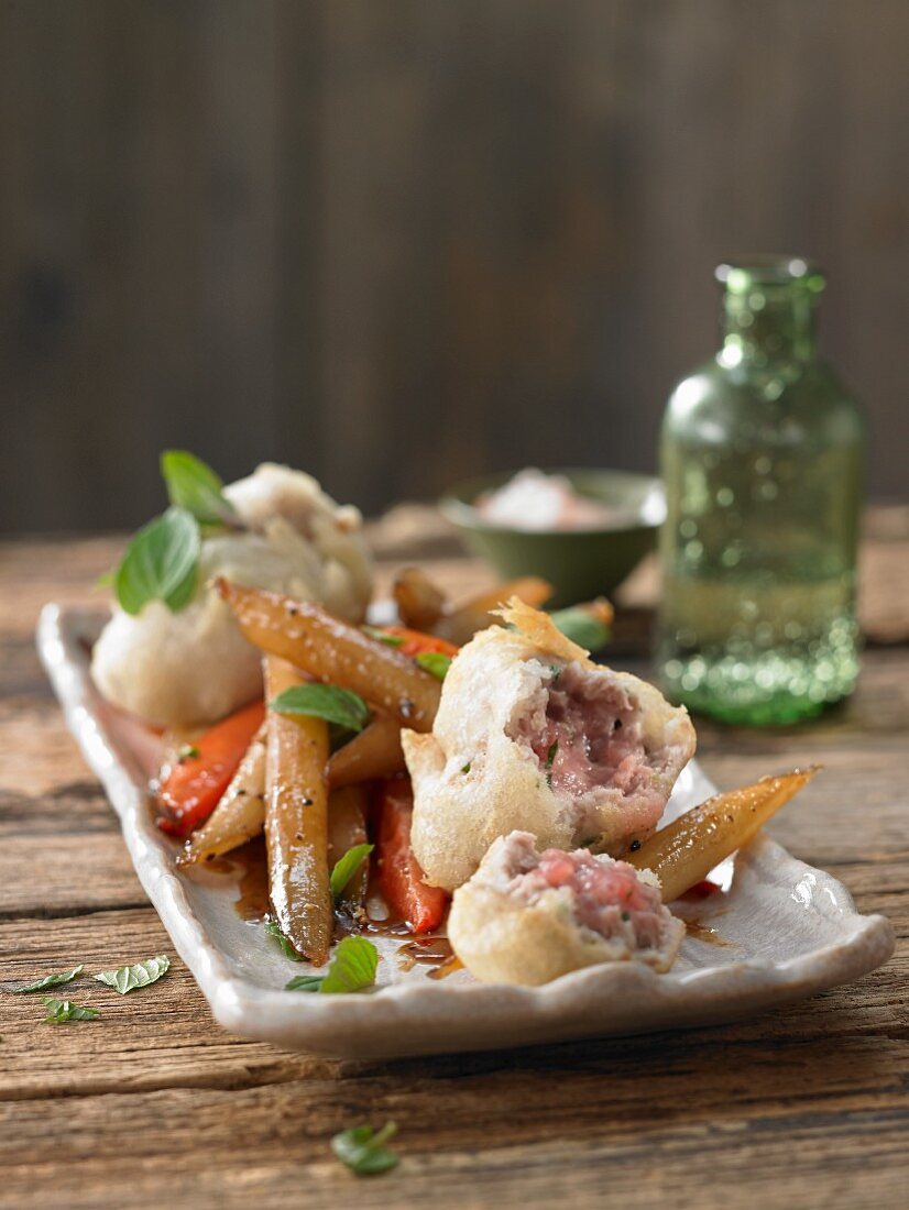 Maple syrup-glazed black salsify with baked tuna fish tatar