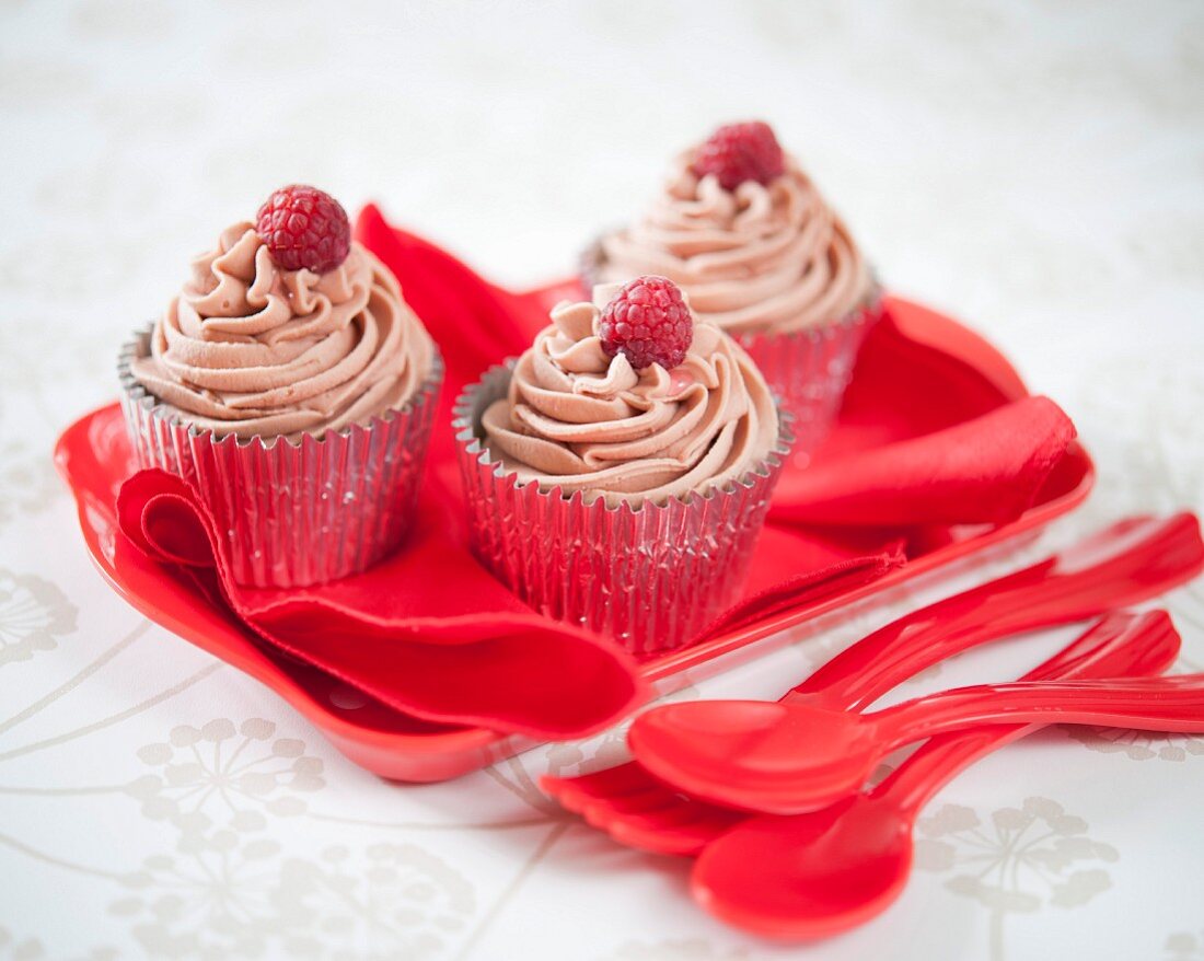 Butterscotch cupcakes with raspberries
