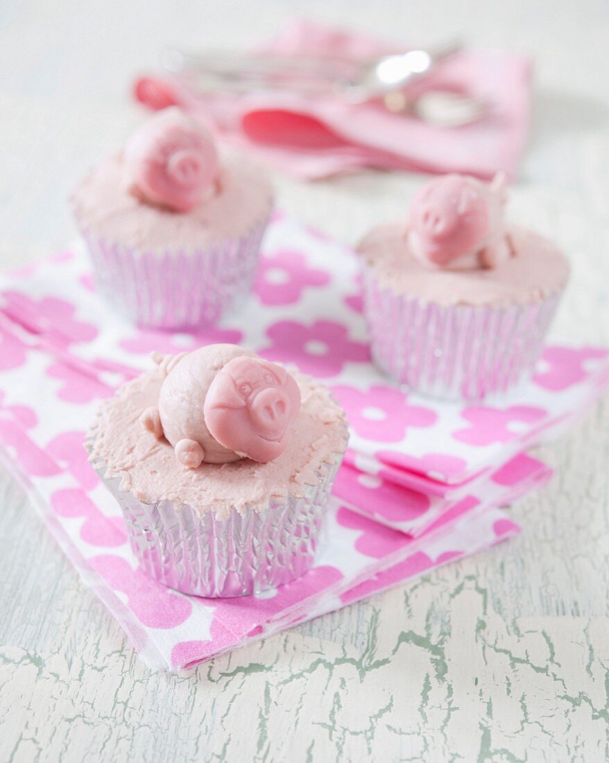 Cupcakes mit rosa Schweinchen