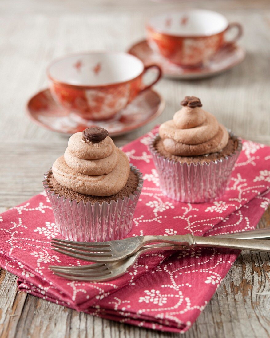 Cafe latte cupcakes on a fabric napkin