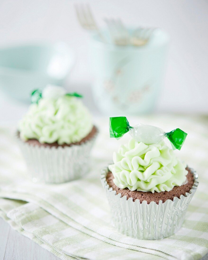 Chocolate cupcakes with mint frosting and mint sweets
