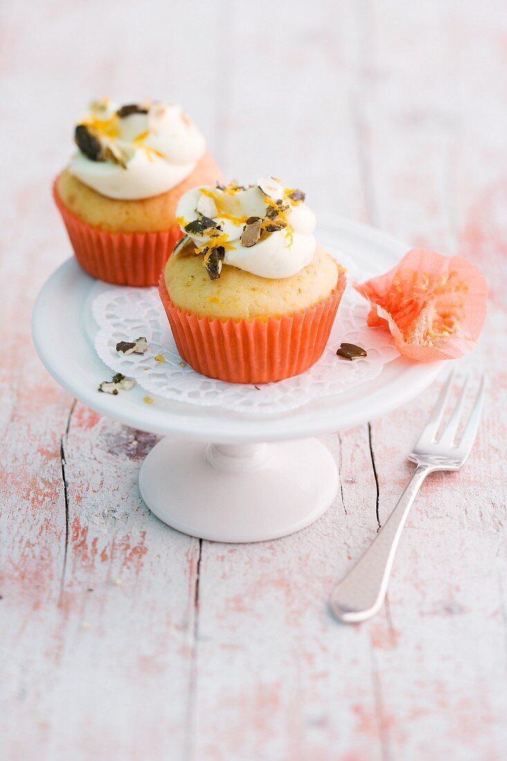 Pumpkin cupcakes with pumpkin seeds