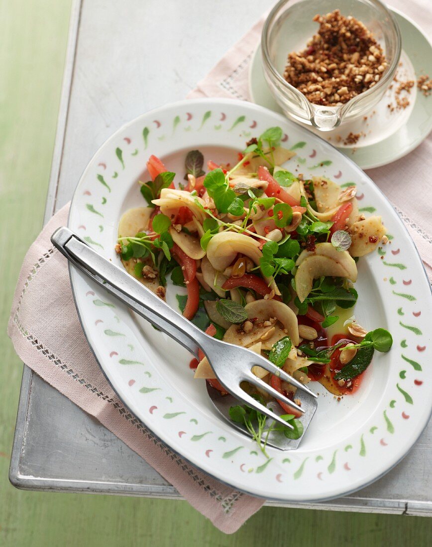 Green papaya salad with pineapple mint, watercress, lime, tomatoes and roasted peanuts