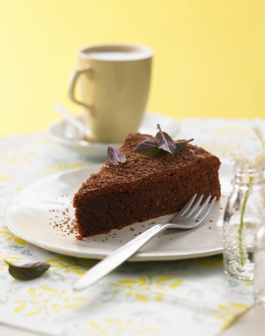 A slice of sweet beetroot chocolate cake with chocolate mint