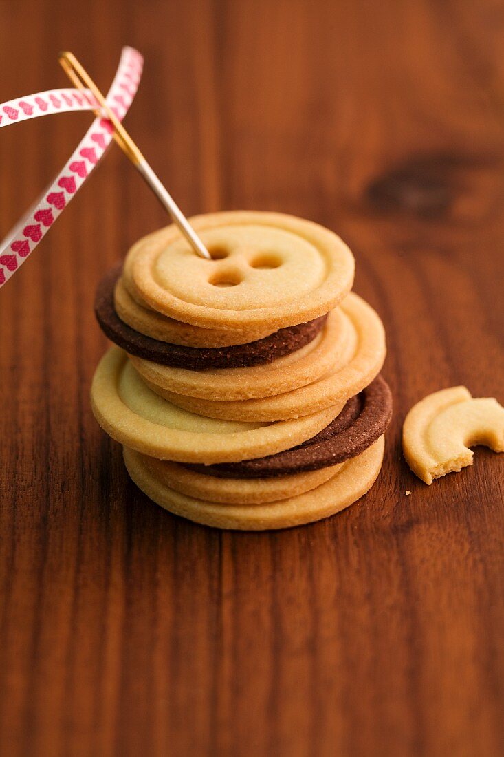 A stack of light and dark button biscuits