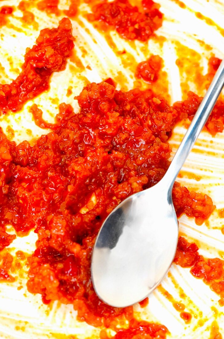 Harissa (North African chilli sauce) with a spoon