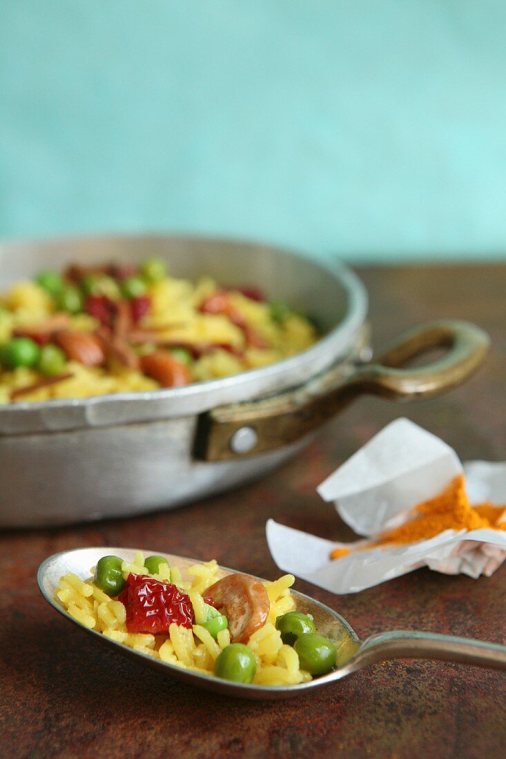 Rice with saffron, peas, dried tomatoes and cashew nuts