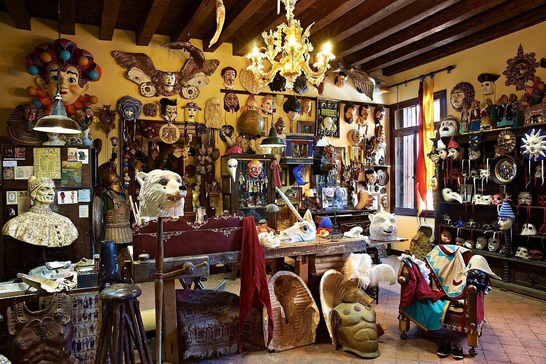 Mask sculptor's workshop in traditional interior