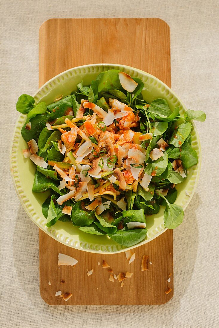 Watercress salad with crab, mango and coconut chips