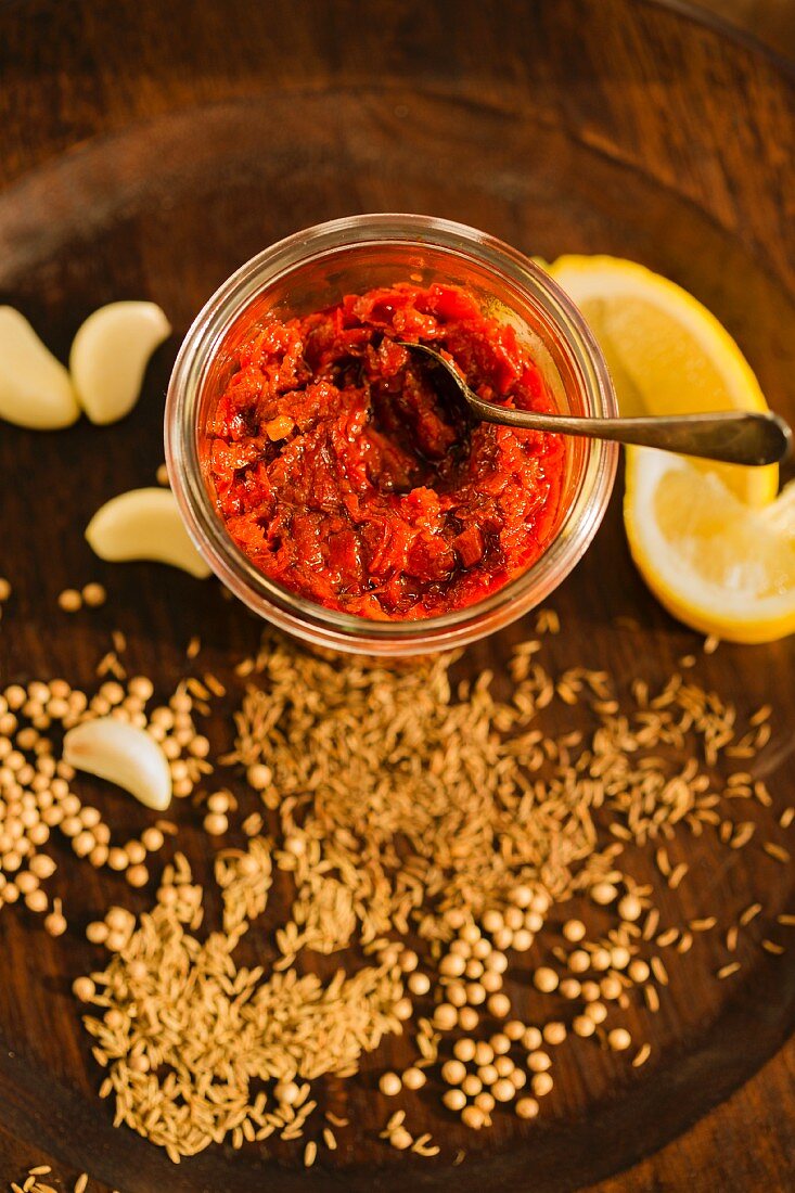 A jar of homemade harissa paste (seen from above)