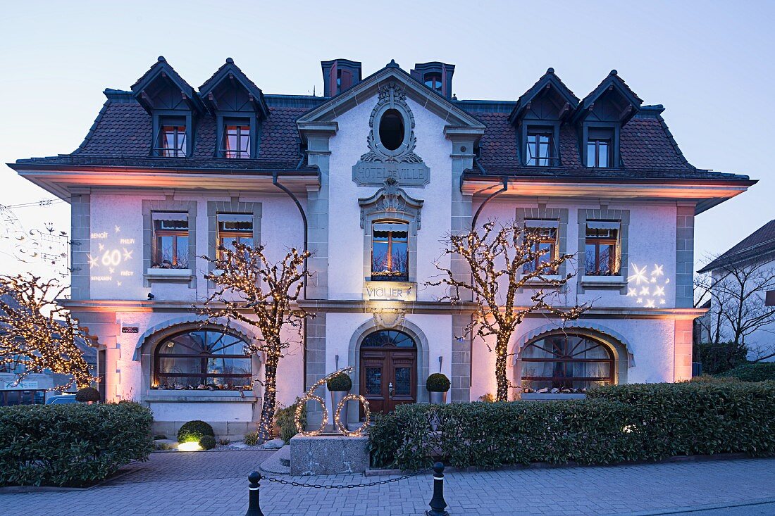 An exterior shot of the elegant restaurant Hotel de Ville, Switzerland
