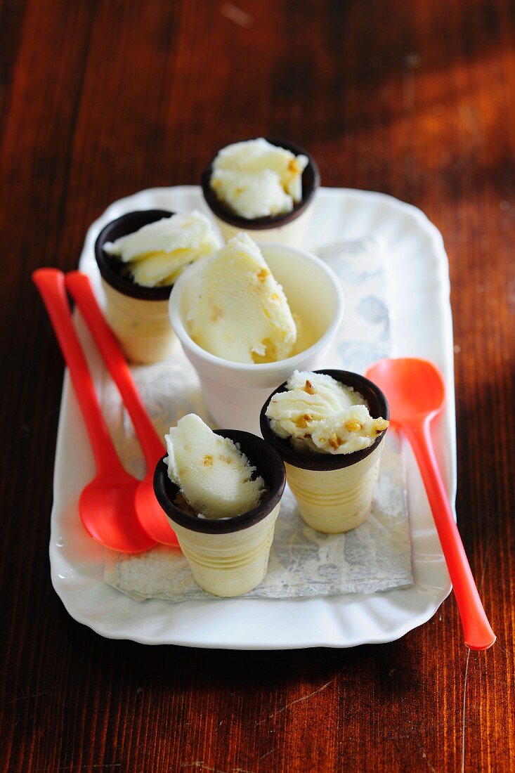 Egg liqueur and caramel ice cream in cone cups