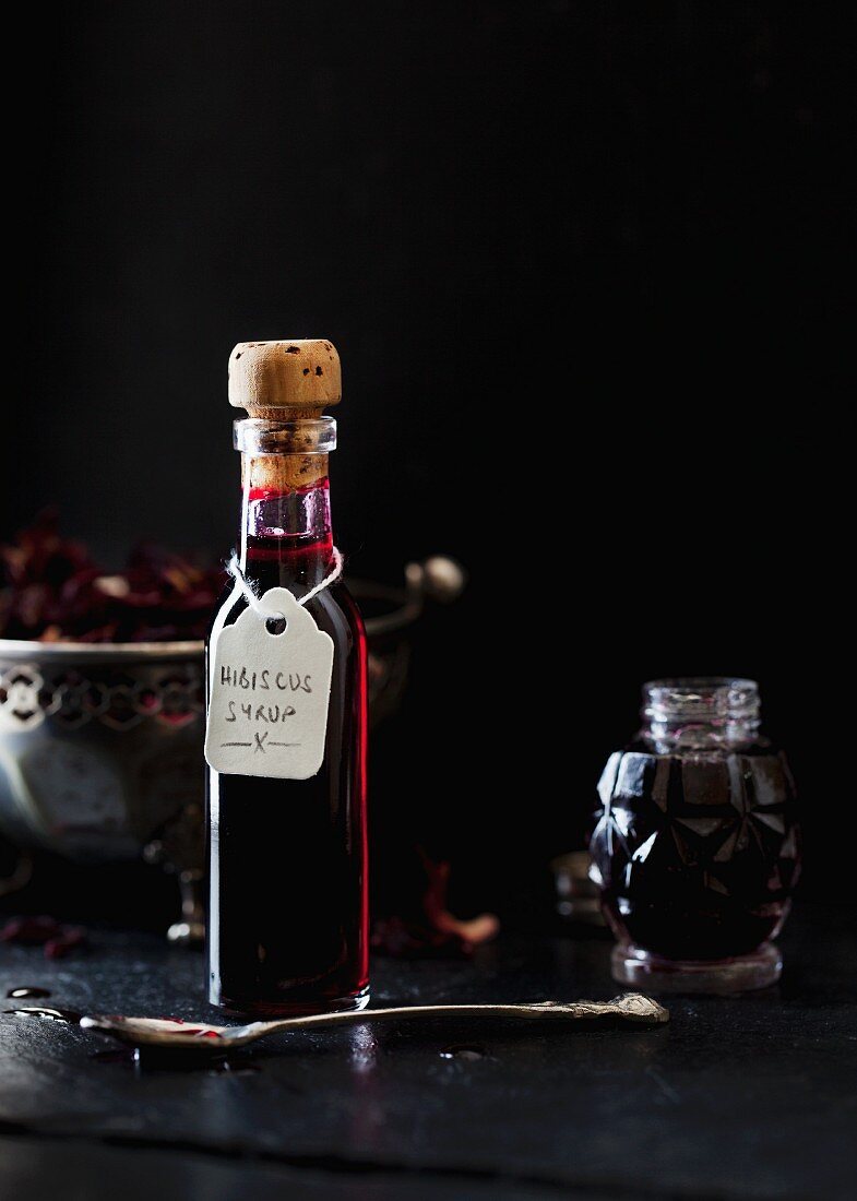 Hibiscus syrup in a glass bottle