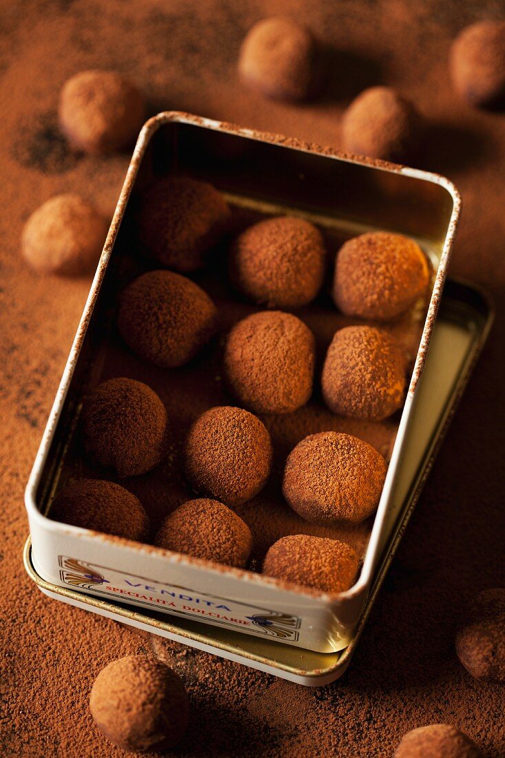 Chocolate truffles in a metal tin