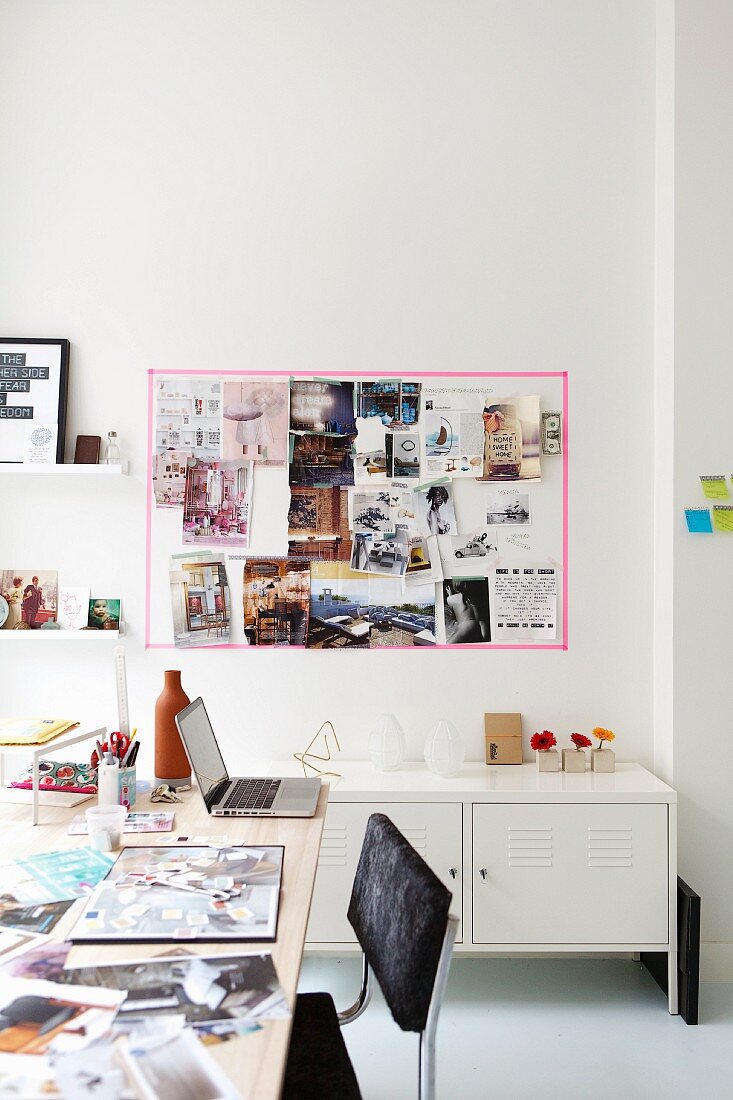 Mit Masking Tape eingerahmtes Moodboard an der Wand im Arbeitszimmer