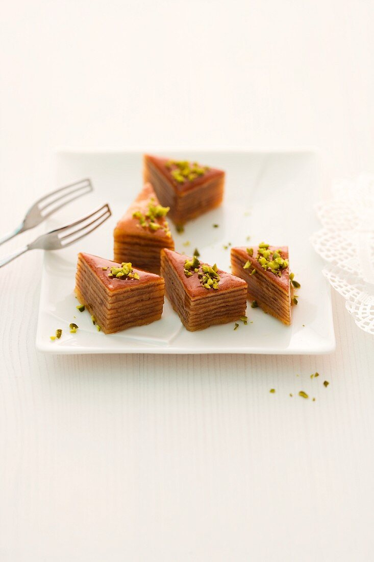 Baumkuchen (German layer cake) slices with pistachios