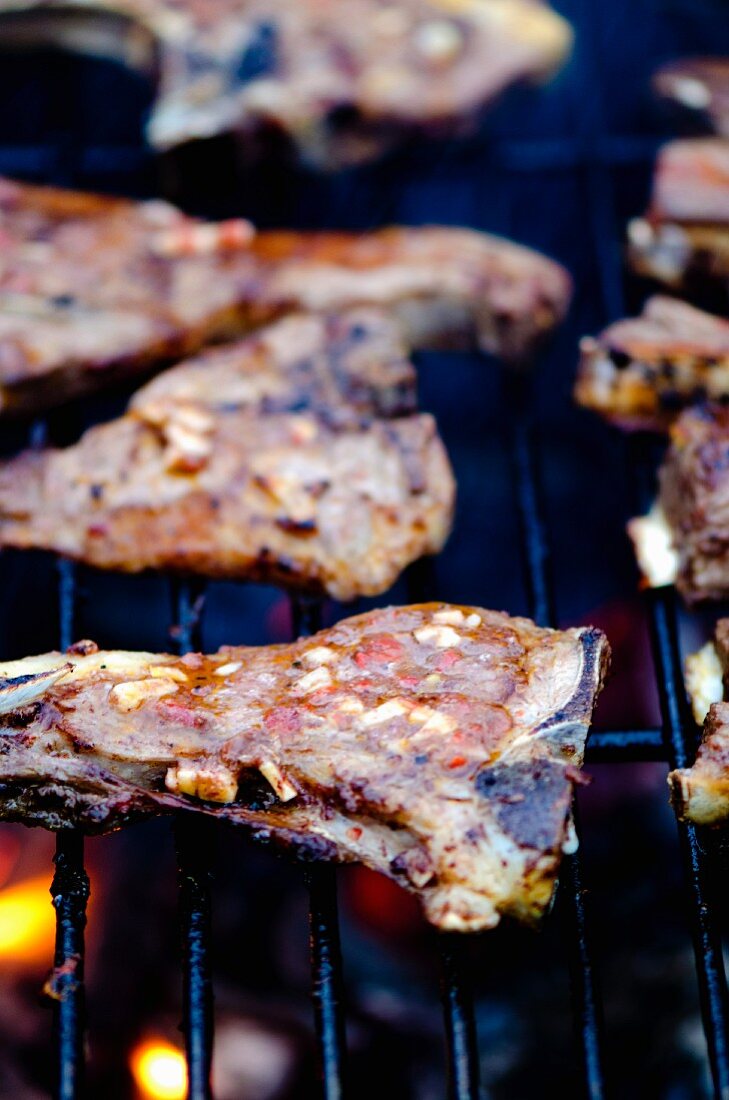 Lamp chops marinated with chilli and garlic on a barbecue