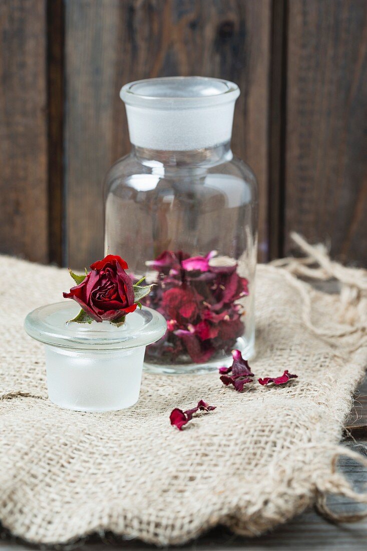 Dried rose petals in a glass jar