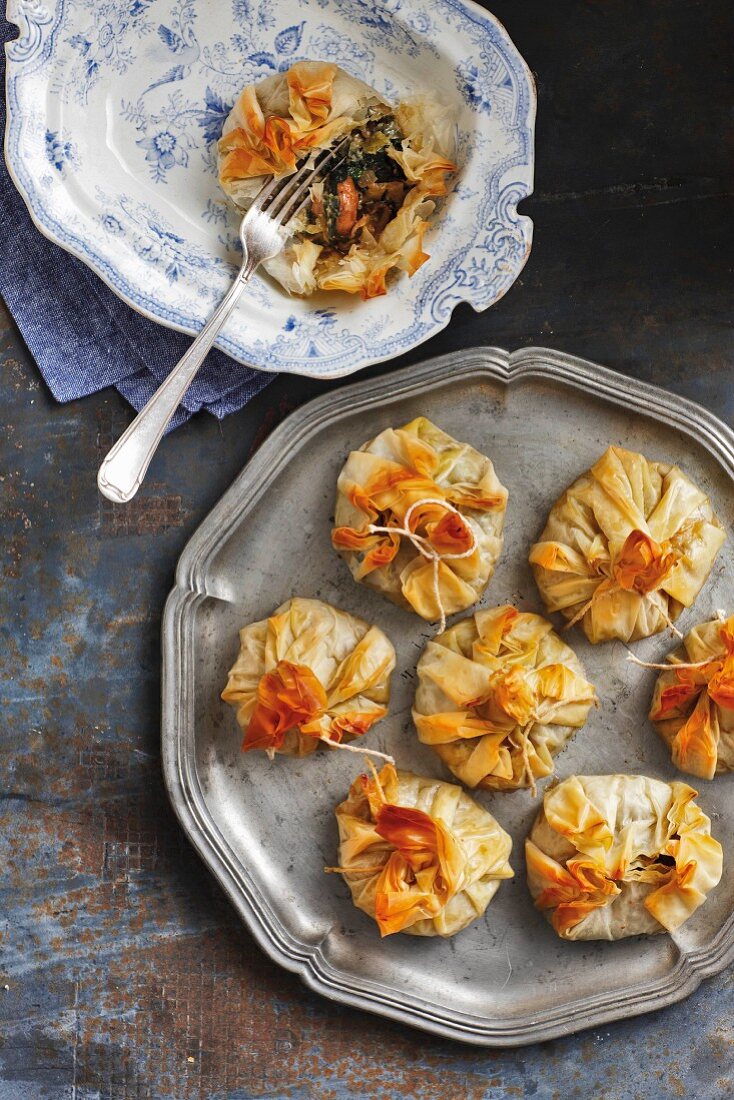 Filo pastry sacks filled with spinach, mushrooms and Greyerzer cheese