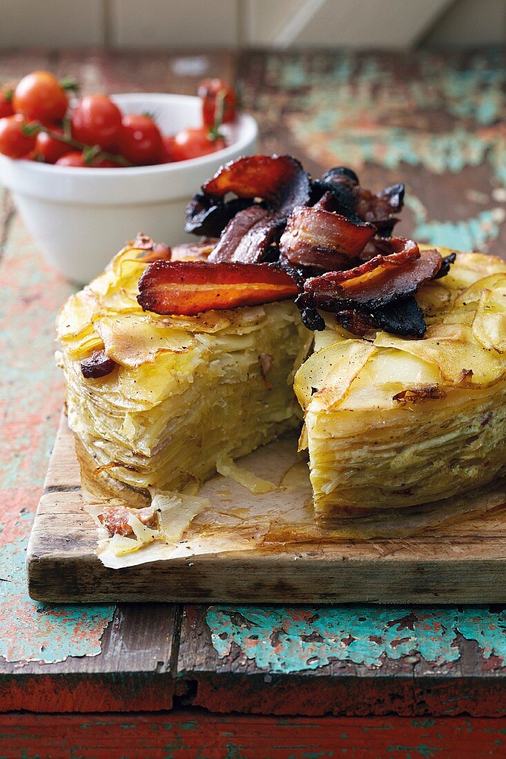 Potato cake with leek and crispy bacon