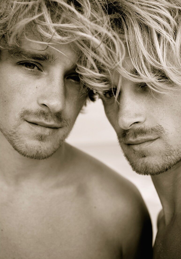 A close-up portrait of blond twin brothers (sepia photo)