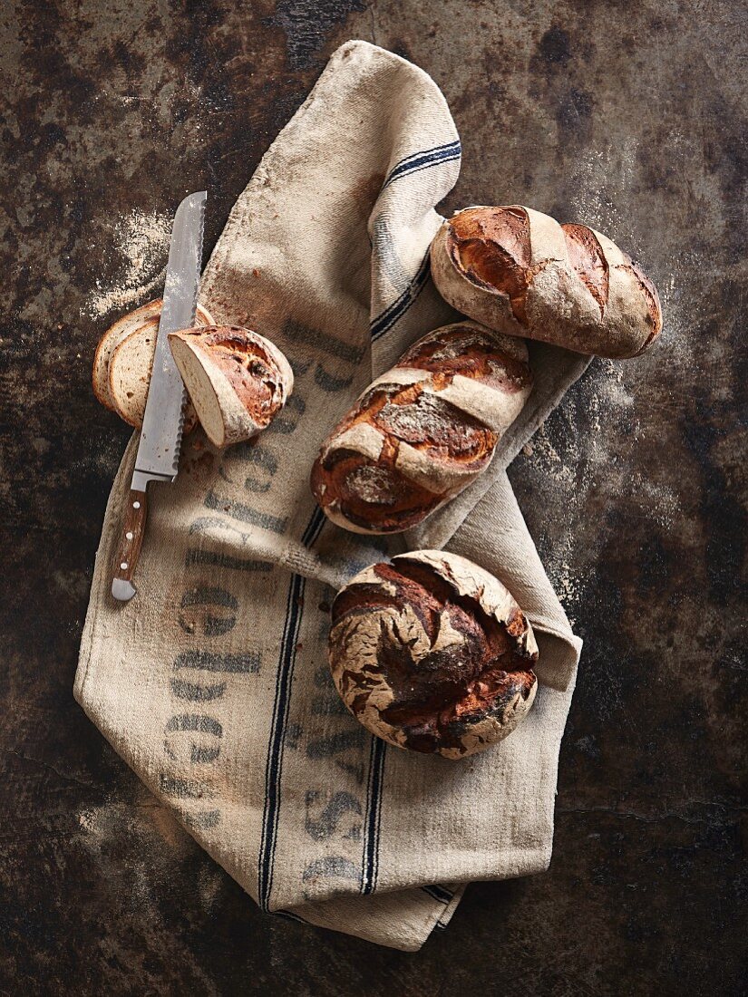 An arrangement of bread with a knife