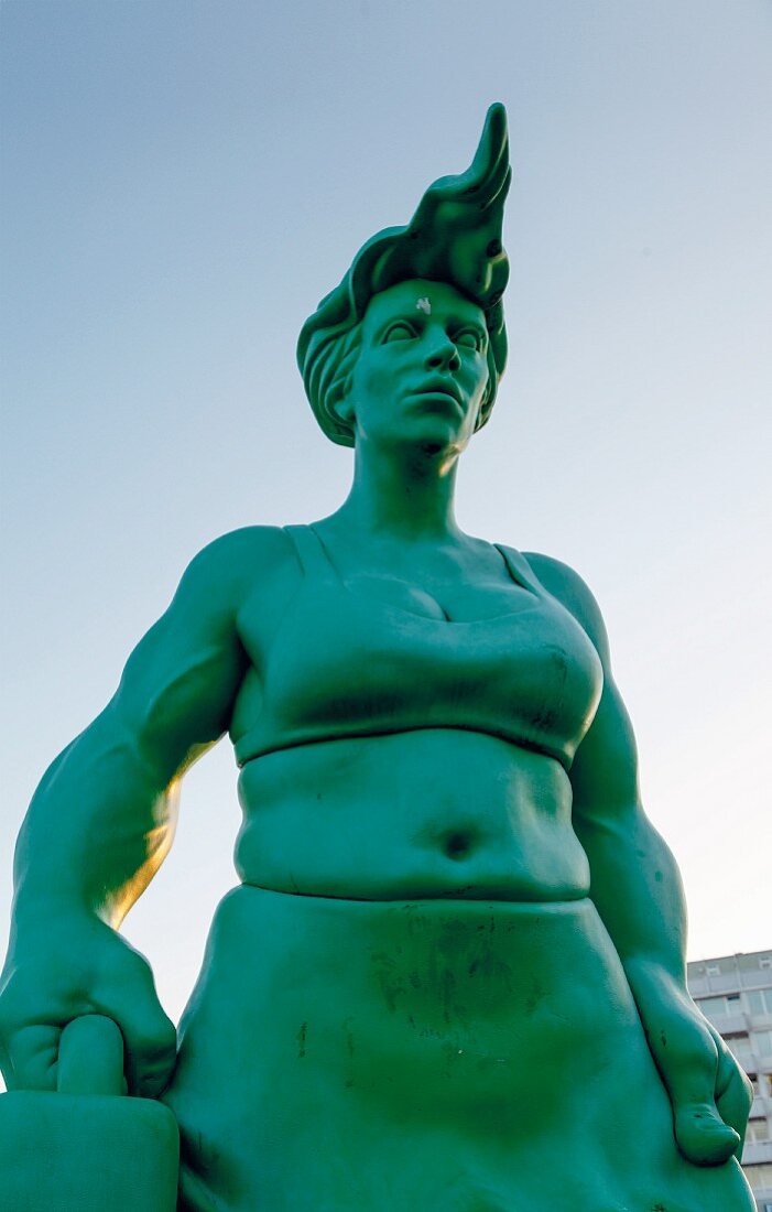 A green giant statue at Westerland station, Sylt
