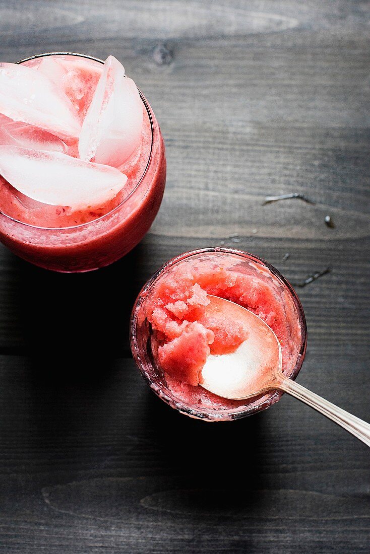 A strawberry smoothie with ice and strawberry granita