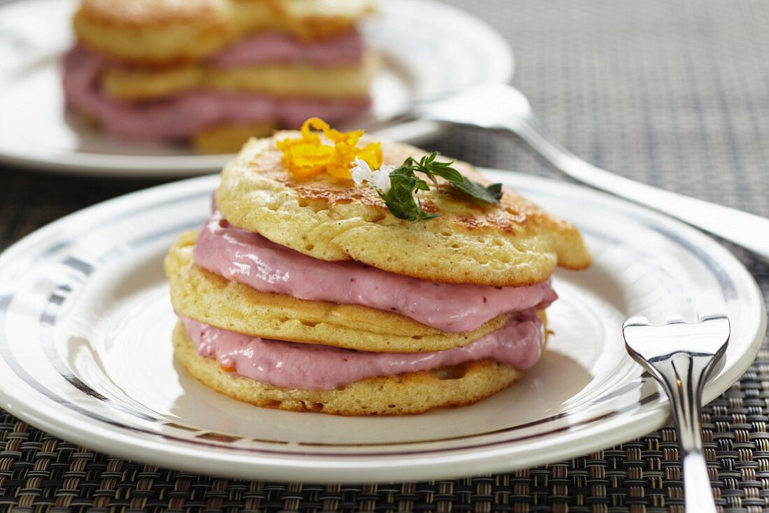 Blinis with lingonberry cream