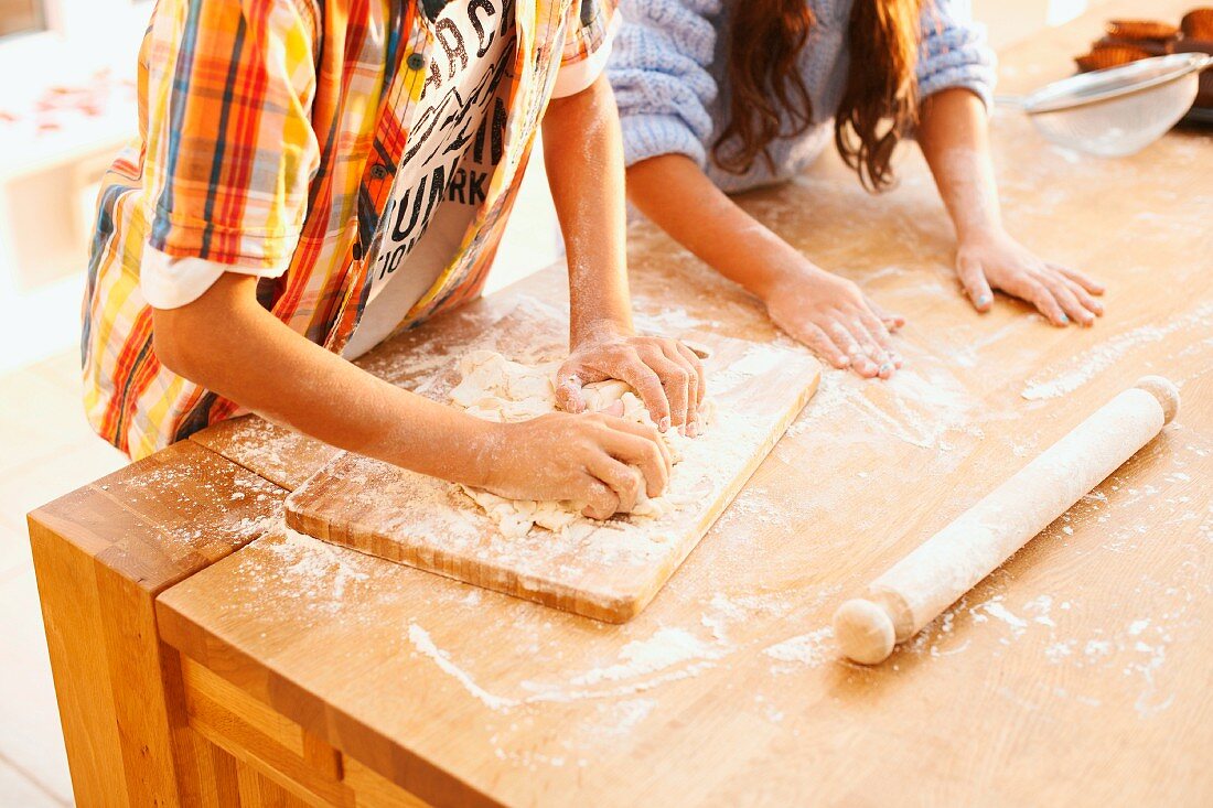 Children baking, mixing ingredients