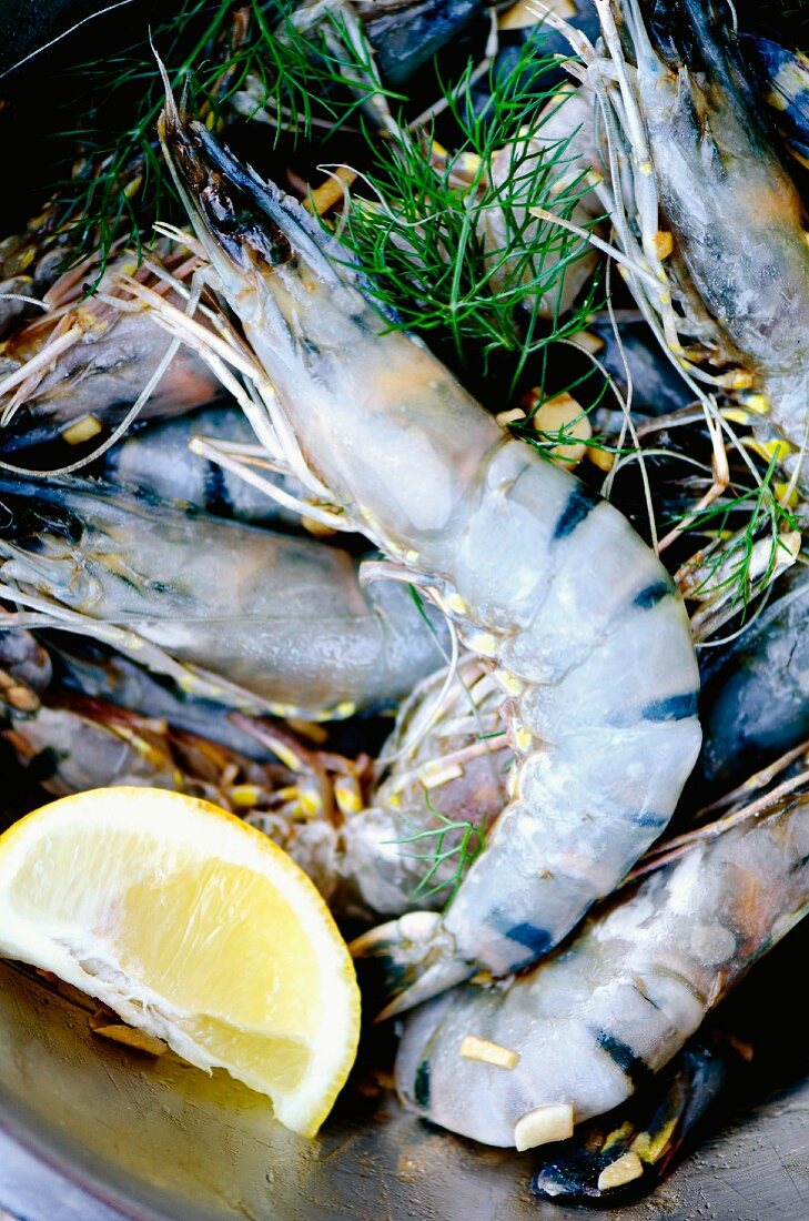 Fresh king prawns in a herb and lemon marinade