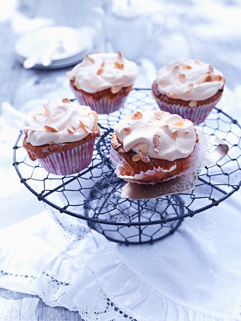 Rhubarb cupcakes with meringue and flaked almonds