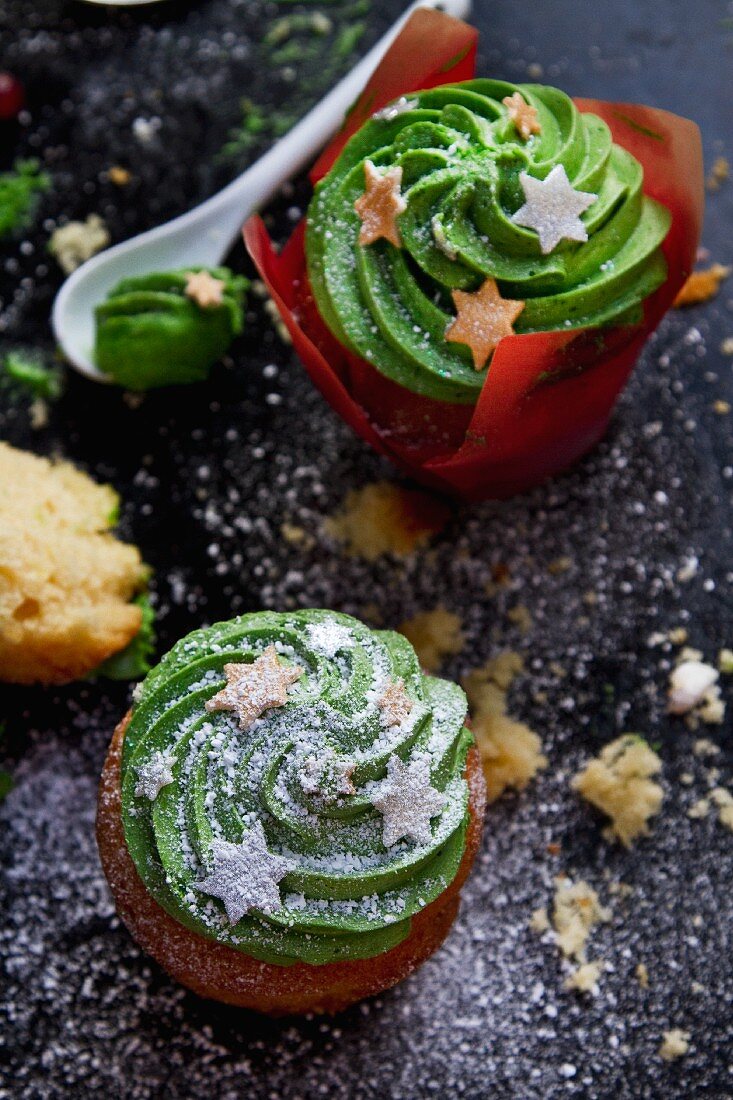 Christmas cupcakes decorated with green frosting