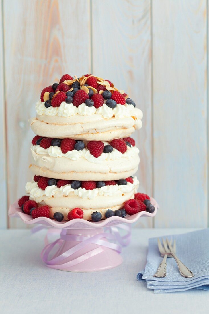 Meringue cake with cream and berries