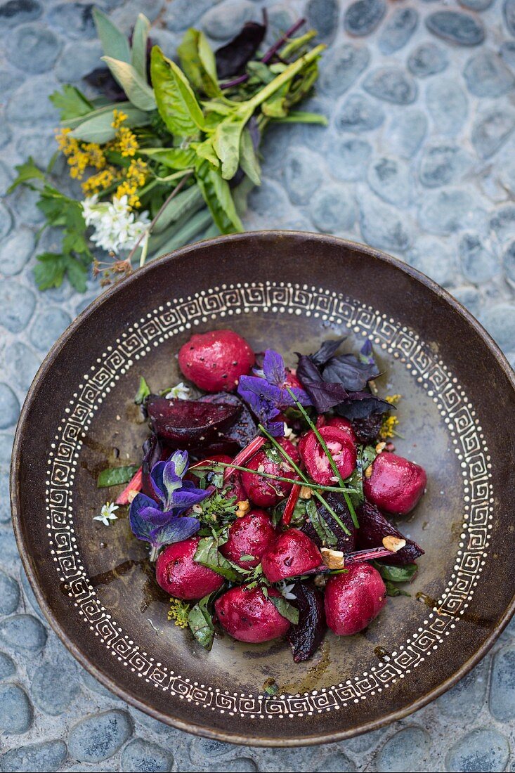 Beetroot gnocchi filled with mascarpone pony