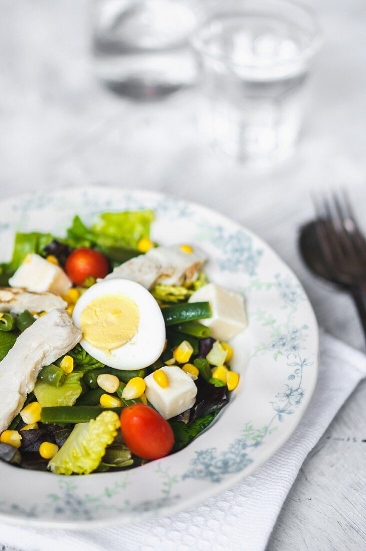 Vegetable salad with feta cheese, egg and sweetcorn