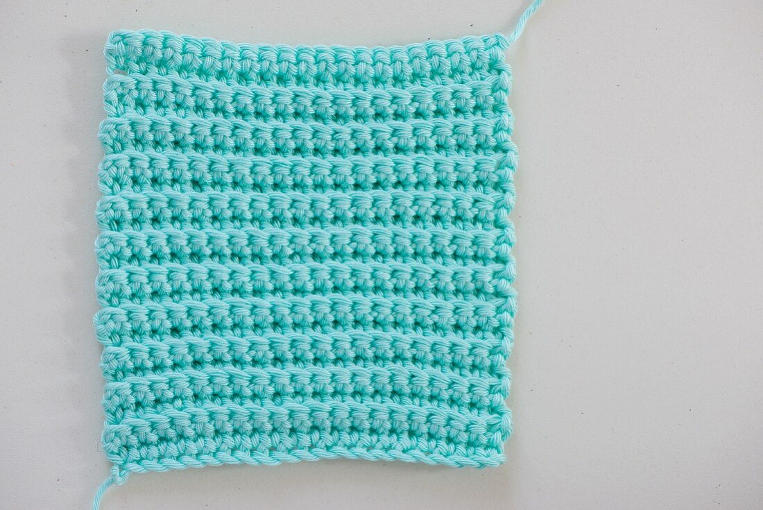 A crochet gauge: single crochet in back loop of stitch
