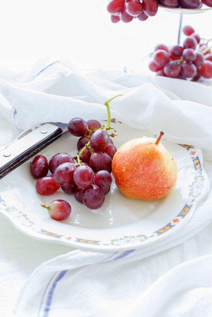 Grapes and pears on a plate