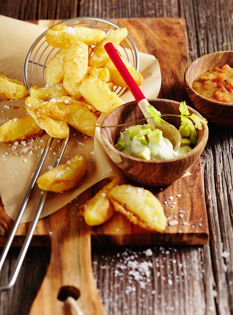 Beer-battered potato chips with a spicy tomato and avocado dip (Australia)