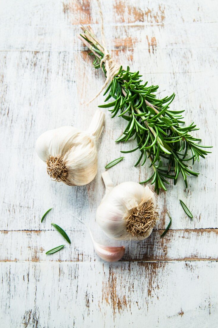 Garlic bulbs and rosemary