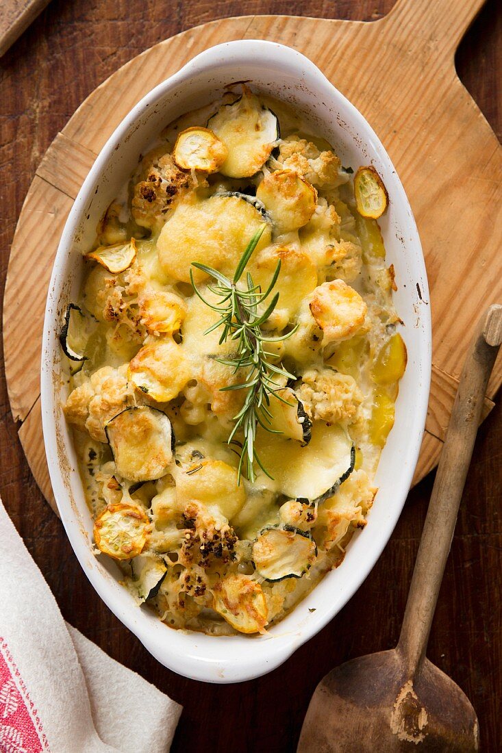 Courgette and cauliflower bake with potatoes and rosemary