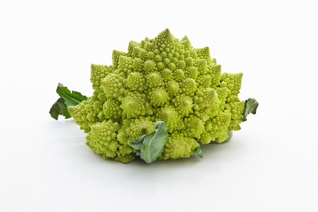 Romanesco broccoli on a white surface