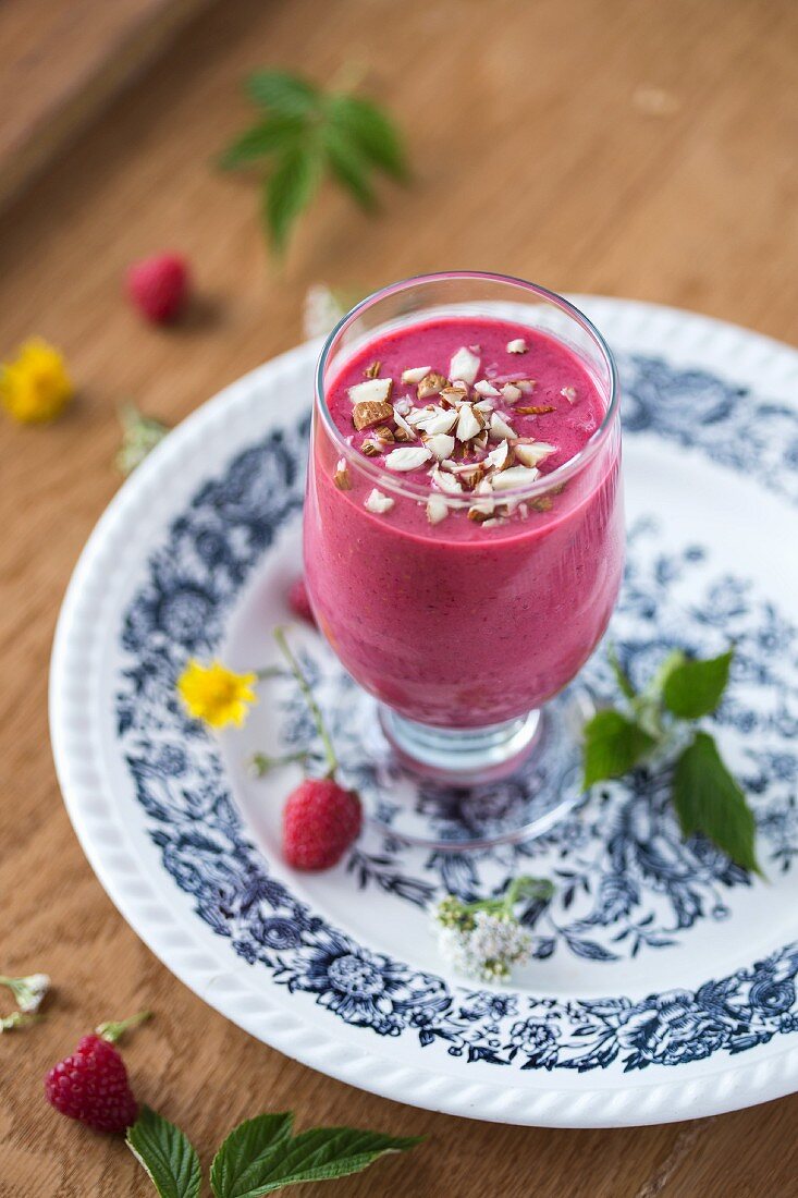 A raspberry smoothie with almonds
