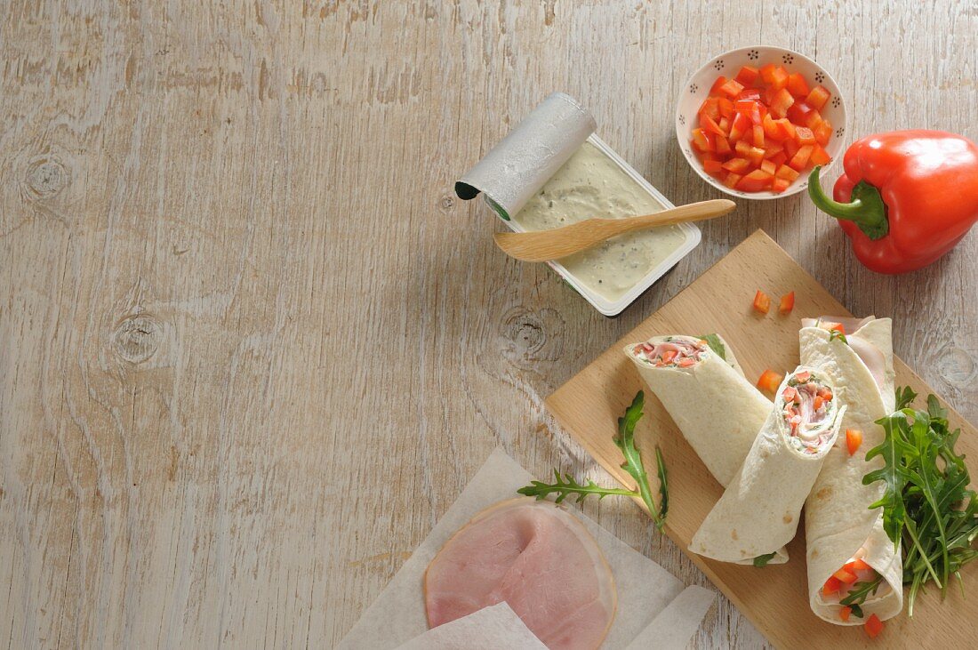 Wraps with peppers, ham and cream cheese