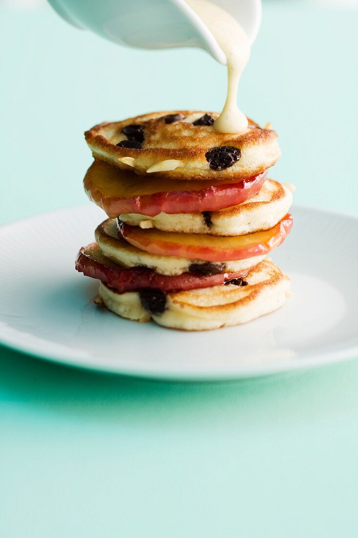 Baked apple blinis with vanilla sauce