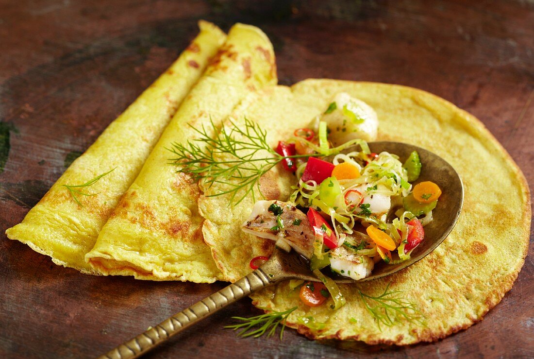 Curry pancakes with fish ragout