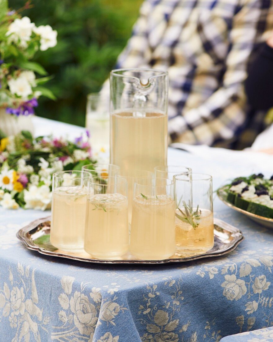 Rosemary drinks on a tray for a mid-summer festival